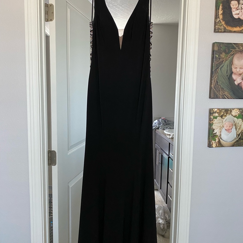 Xscape Black V-Neck Maxi Gown with Sleek Silhouette